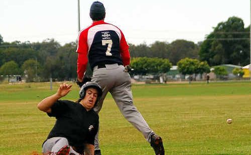 PAY DIRT: Coffs Dodgers Perry Gordon slides into third base. PAY DIRT: Coffs Dodgers Perry Gordon slides into third base.